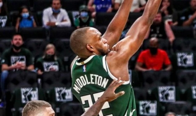  巴特勒三双热火加时险胜尼克斯  